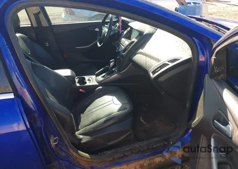 2014 Ford Focus Titanium z USA, uszkodzony, nr VIN 1FADP3J20EL240367